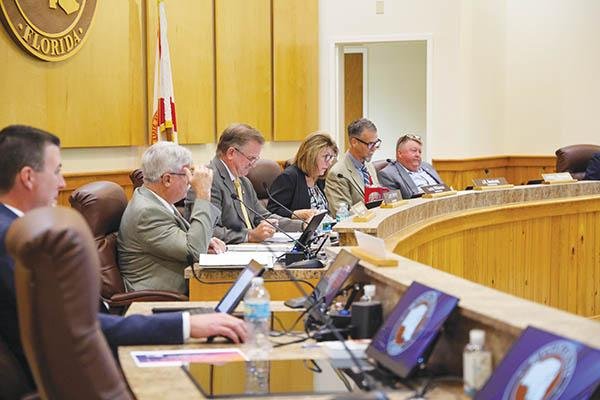 The Putnam County Board of Commissioners participates Aug. 12 in the first reading of an ordinance to restrict where sexual offenders and predators are allowed to live in the county. (File photo)